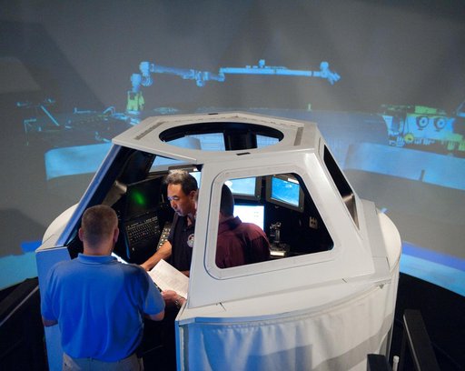 Satoshi Furukawa during FF RNDZ ADV1 training in the ISS cupola trainer in the SES dome.