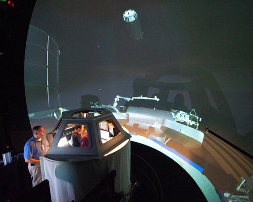 Satoshi Furukawa during FF RNDZ ADV1 training in the ISS cupola trainer in the SES dome.