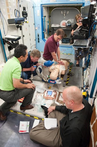 Expedition 28 crew members Mike Fossum, Satoshi Furukawa, Sergei Volkov