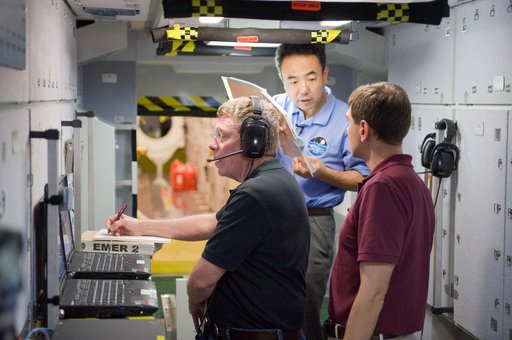 ISS 28 crew member Mike Fossum, Satoshi Furukawa, Sergei Volkov