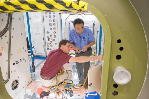ISS 28 crew member Mike Fossum, Satoshi Furukawa, Sergei Volkov