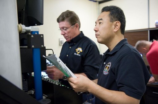 Expedition 28 JAXA astronaut Satoshi Furukawa and Astronaut Mike Fossum