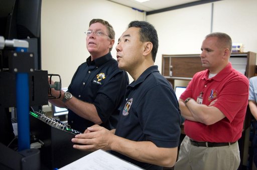 Expedition 28 JAXA astronaut Satoshi Furukawa and Astronaut Mike Fossum