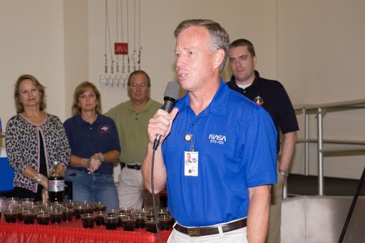 STS-133 cake cutting ceremony marking the end of their training.
