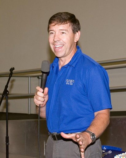 STS-133 cake cutting ceremony marking the end of their training.