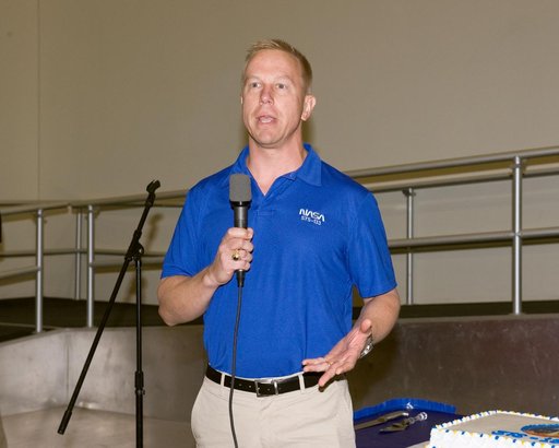 STS-133 cake cutting ceremony marking the end of their training.