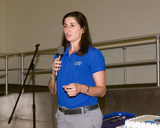 STS-133 cake cutting ceremony marking the end of their training.