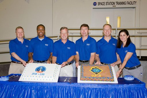 STS-133 cake cutting ceremony marking the end of their training.