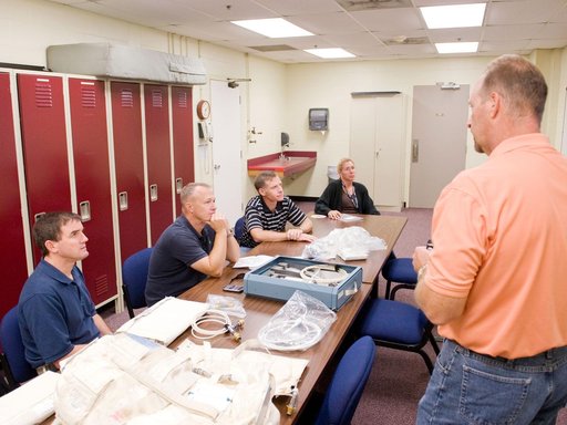 STS-135 (335) crew during Water Ops training with instructor Rob Tomaro