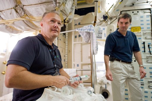 STS-135 (335) crew during Water Ops training with instructor Rob Tomaro