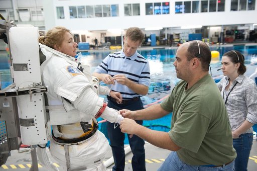 STS-335 (135) crew members Rex Walheim and Sandy Magnus