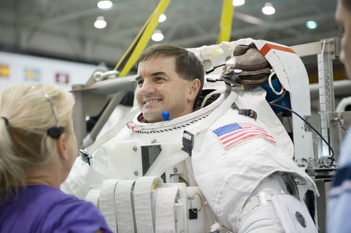 Expedition 27 crew member Ron Garan with STS-335 crew member Rex Walheim