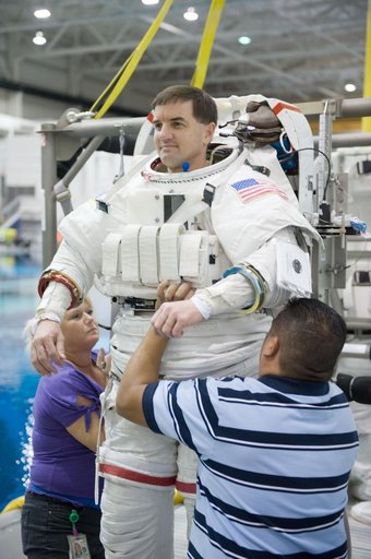 Expedition 27 crew member Ron Garan with STS-335 crew member Rex Walheim