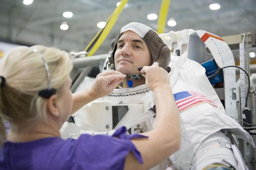 Expedition 27 crew member Ron Garan with STS-335 crew member Rex Walheim