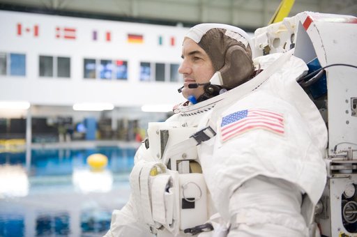 Expedition 27 crew member Ron Garan with STS-335 crew member Rex Walheim