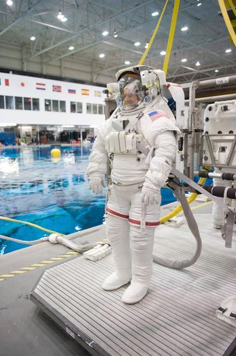 Expedition 27 crew member Ron Garan with STS-335 crew member Rex Walheim