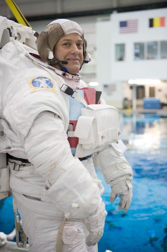 Expedition 27 crew member Ron Garan with STS-335 crew member Rex Walheim