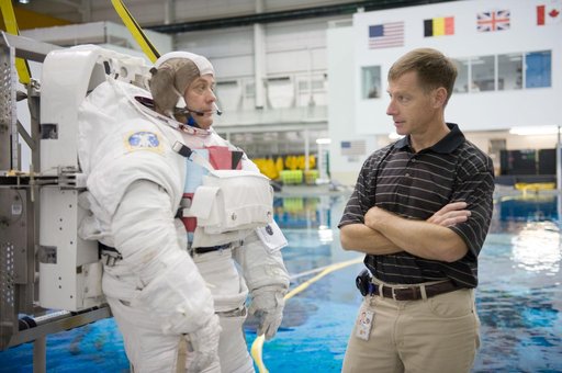 Expedition 27 crew member Ron Garan with STS-335 crew member Rex Walheim