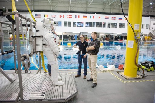 Expedition 27 crew member Ron Garan with STS-335 crew member Rex Walheim