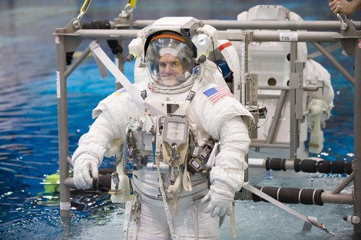 Expedition 27 crew member Ron Garan with STS-335 crew member Rex Walheim