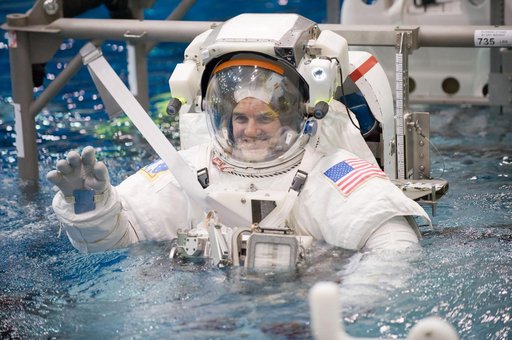 Expedition 27 crew member Ron Garan with STS-335 crew member Rex Walheim