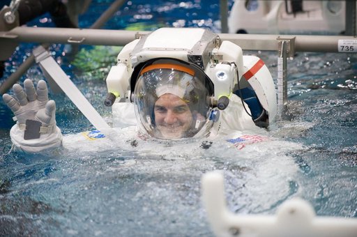 Expedition 27 crew member Ron Garan with STS-335 crew member Rex Walheim
