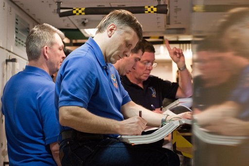 Expedition 27, Expedition 28 and STS-135 during joint ISS/STS Emergency Scenarios training.