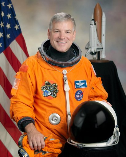 Official Astronaut Portrait of Greg Johnson in ACES suit