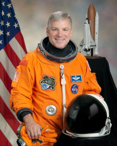 Official Astronaut Portrait of Greg Johnson in ACES suit