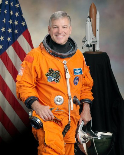 Official Astronaut Portrait of Greg Johnson in ACES suit
