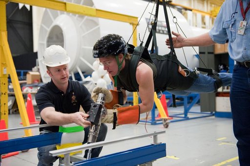 STS-135 crew members Rex Walheim and Sandra Magnus