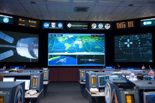 ISS Orbit 2 flight controllers on console with Flight Director Bob Dempsey