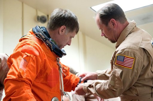 STS-135 Crew during prep and insertion into Fixed Base Simulator