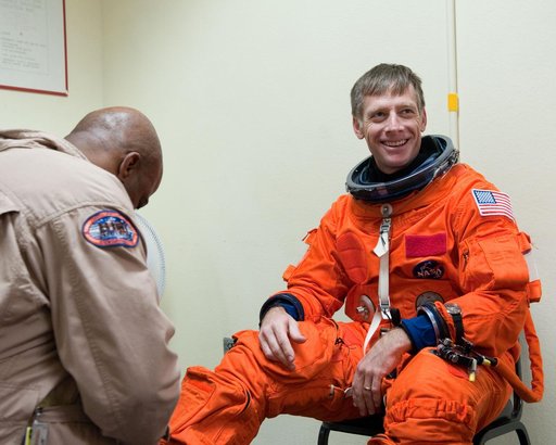 STS-135 Crew during prep and insertion into Fixed Base Simulator