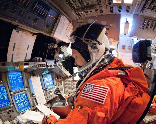 STS-135 Crew during prep and insertion into Fixed Base Simulator