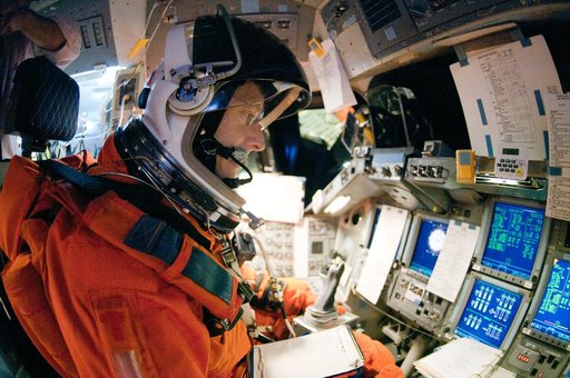 STS-135 Crew during prep and insertion into Fixed Base Simulator