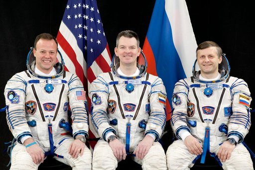 Expedition 27 prime and backup crew and individual portraits from Russia