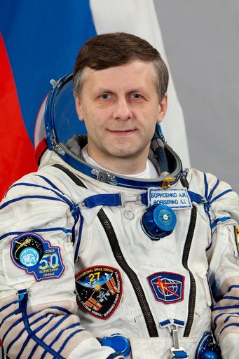 Expedition 27 prime and backup crew and individual portraits from Russia