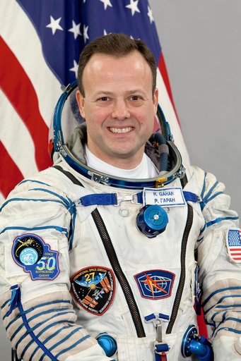 Expedition 27 prime and backup crew and individual portraits from Russia