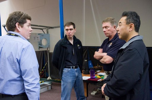 Expedition 28/29 crew members during Docking Timeline Training.