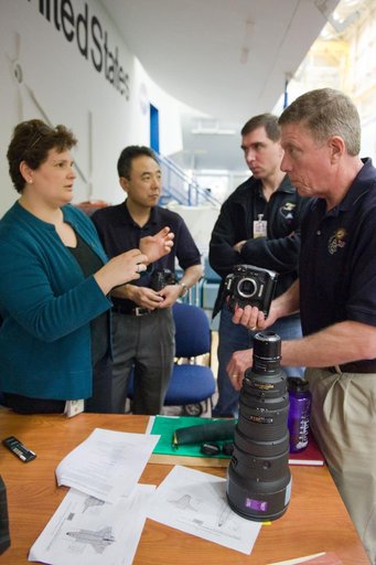 Expedition 28/29 crew members during Docking Timeline Training.