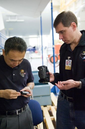 Expedition 28/29 crew members during Docking Timeline Training.