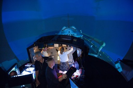 STS-135 crew during Rendezvous Training session in Building 16 dome