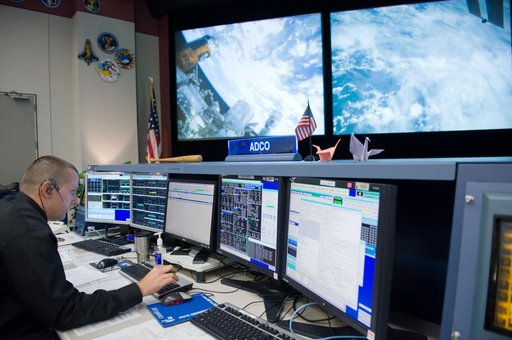 JAXA flight control team gave the Folding Paper Cranes to NASA ISS mission control team