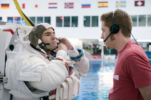 STS-134 crew members Michael Fincke and Greg Chamitoff during their final EVA4 training run at the NBL.