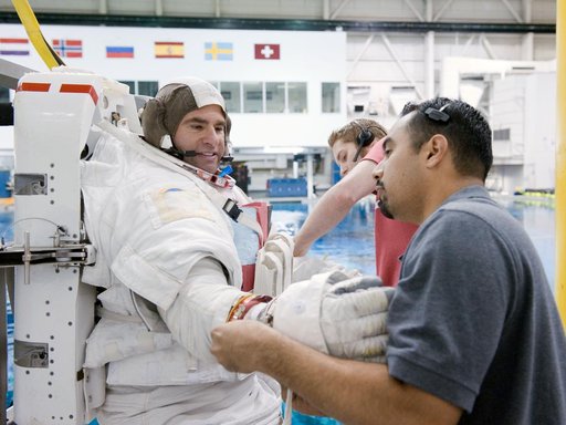 STS-134 crew members Michael Fincke and Greg Chamitoff during their final EVA4 training run at the NBL.