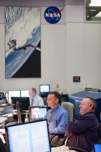 STS-134 Flight Controllers on Console - Launch.