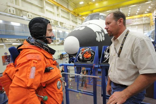 STS-135 crew and training team during CCT-II PRL Ingress/Egress training.