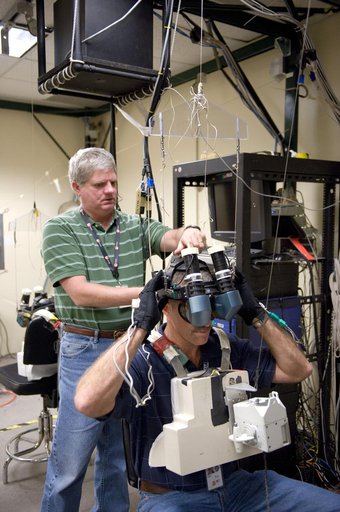 Expedition 29/30 astronaut Dan Burbank during SAFER Proficiency Training in the VR Lab.