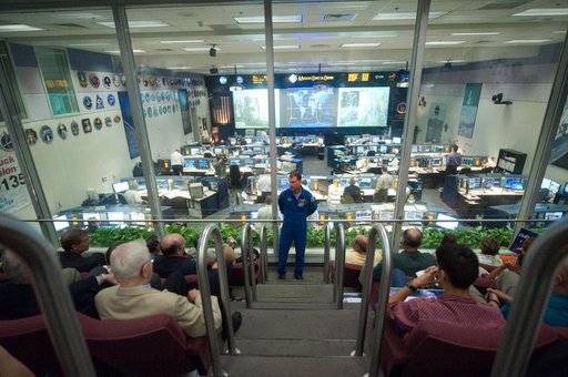 STS135 flight controllers on console during last shuttle mission